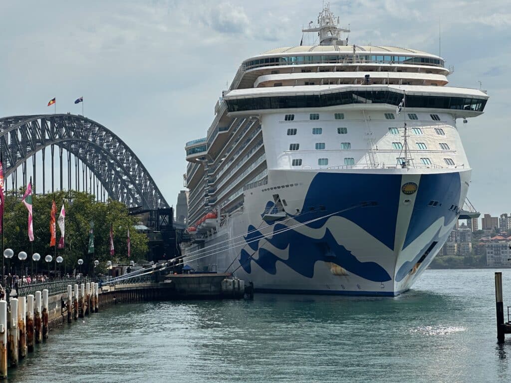 Princess cruise ship docked in Circular Quay with Sydney Harbour Bridge in the background